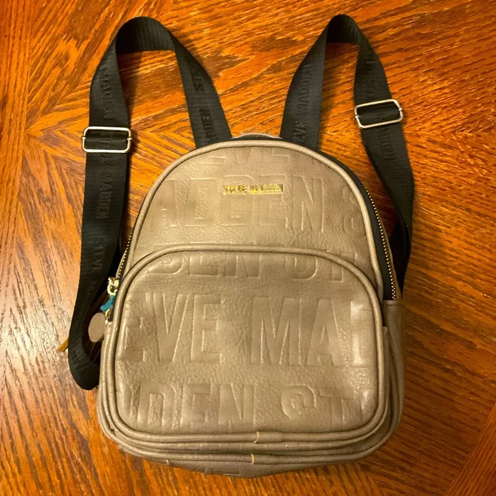 Steve Madden Cute Stylish Durable Mini Backpack Fringe Bag!